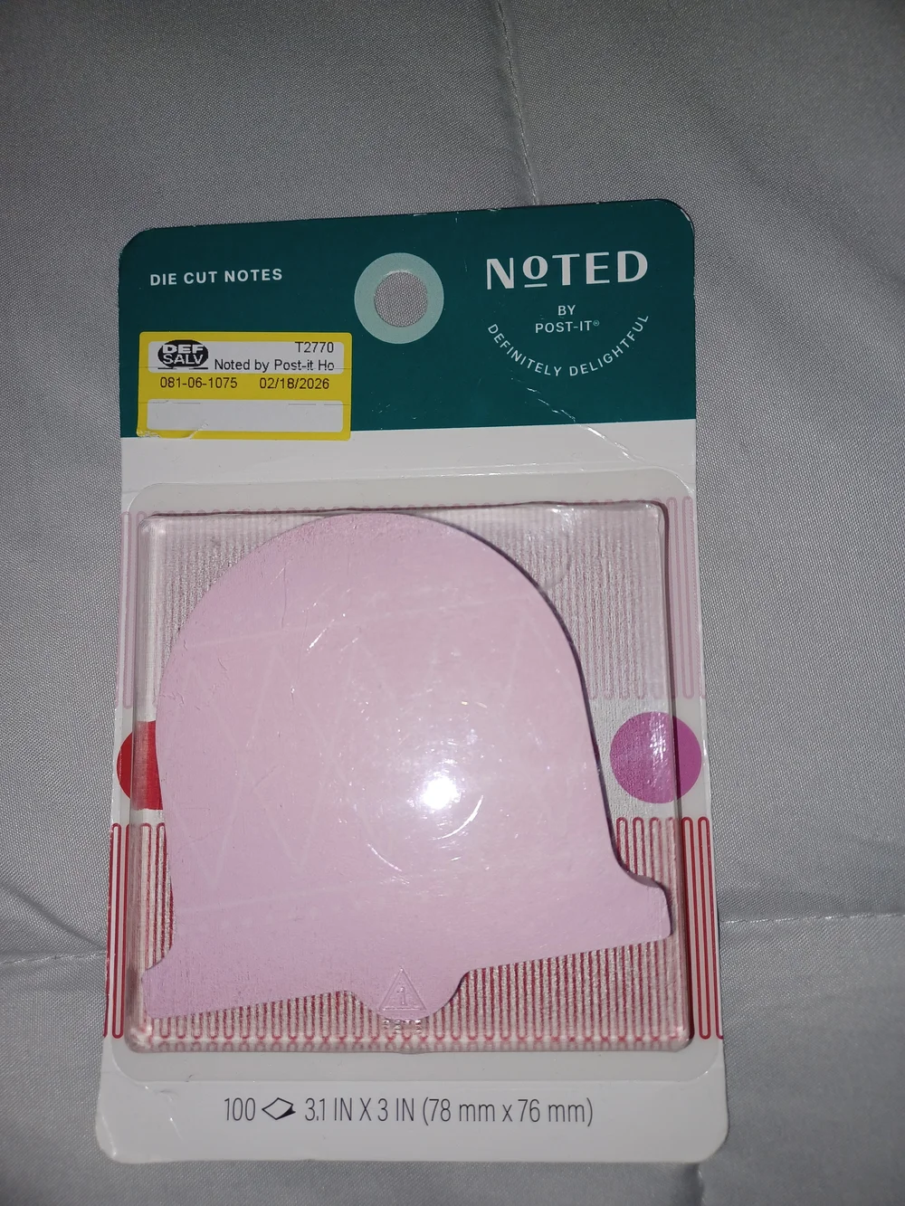 Noted by Post-it® Die Cut Notes shaped like a pink holiday bell, containing 100